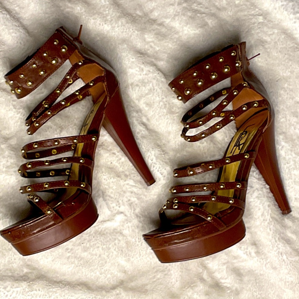 Beautiful brown platform heels with gold grommets